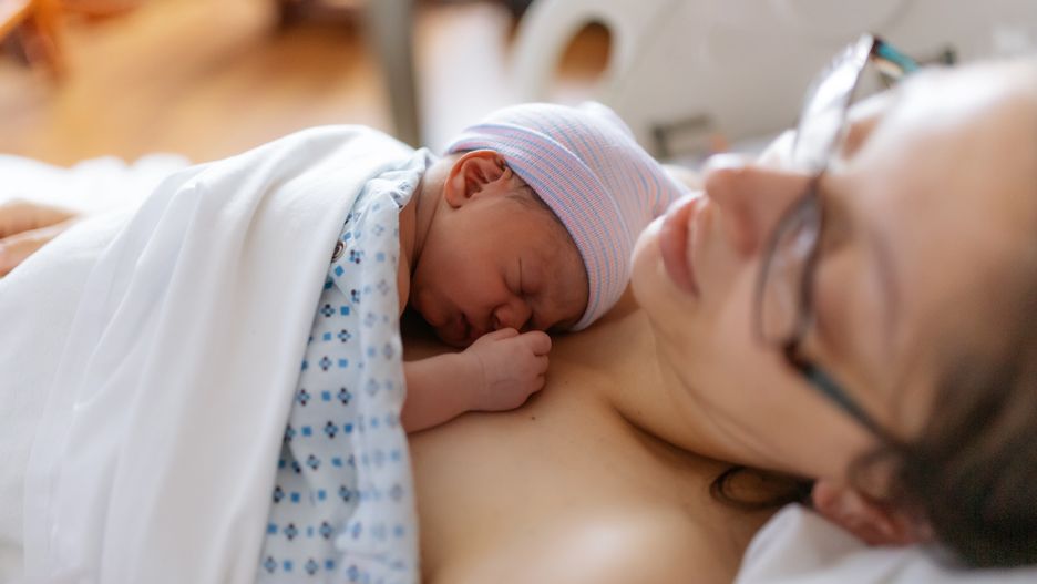 newborn baby in hospital after just being born, mother holding him and breastfeeding in hospital bed mother is dressed in blue night gown
ROHANE HAMILTON
mother, born, new, baby, birth, delivery, mom, newborn, first, boy, hospital, infant, maternity, asleep, bassinet, beautiful, biracial, mixed, blanket, care, child, mothers day, childbearing, comfort, warmth, cute, health, healthy, incubator, just born, life, maternity hospital, ward, nursery, black, white, Caucasian, swaddle, breast, breast feed, feeding, sleep, room, family, love, pregnant, childbirth, labor, plan, pregnancy