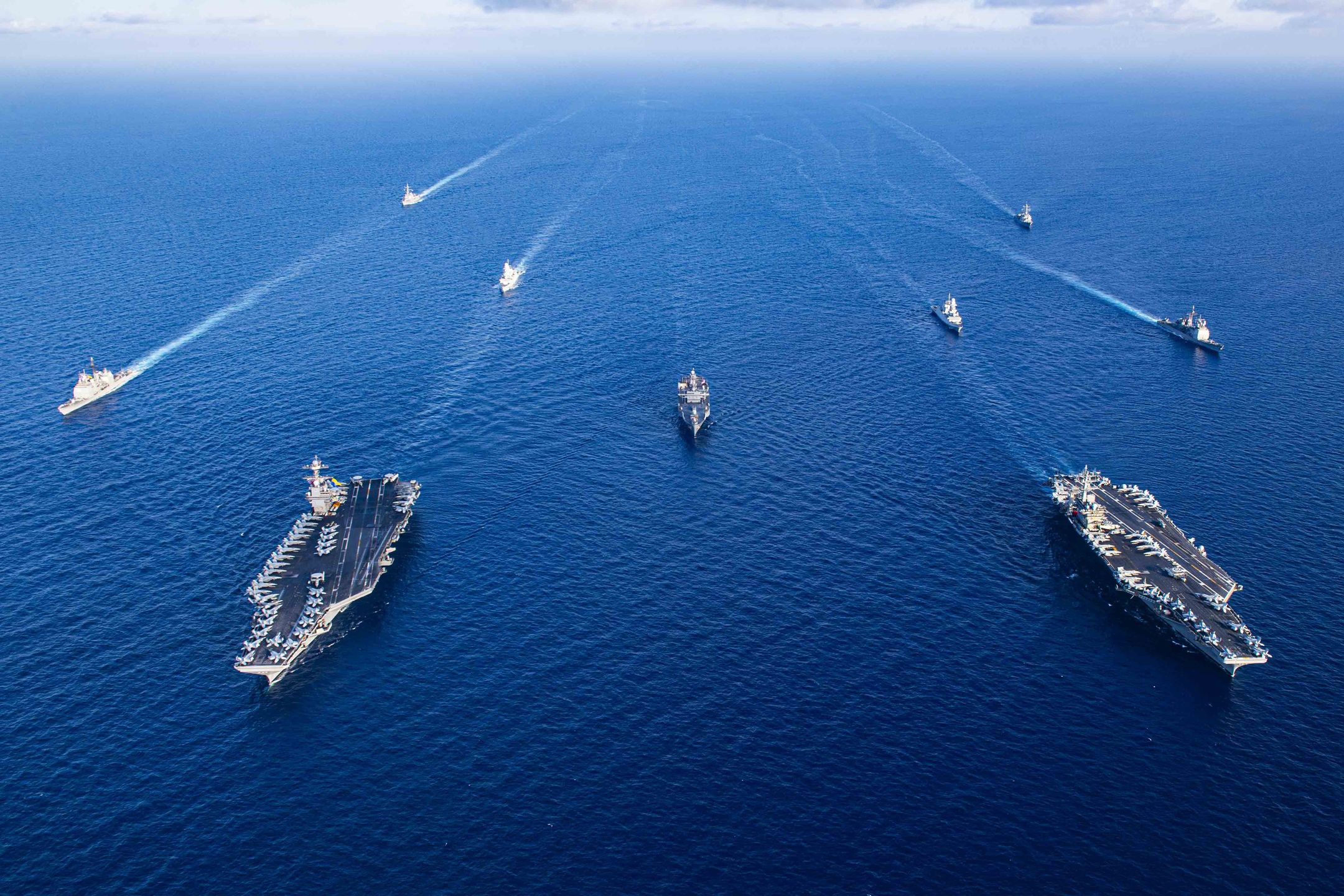 AT SEA - NOVEMBER 03: (----EDITORIAL USE ONLY - MANDATORY CREDIT - 'UNITED STATES NAVY / JANAE CHAMBERS / HANDOUT' - NO MARKETING NO ADVERTISING CAMPAIGNS - DISTRIBUTED AS A SERVICE TO CLIENTS----) An aerial view of aircraft carriers of the United States Navy USS Gerald R. Ford and USS Dwight D. Eisenhower together in eastern Mediterranean on November 03, 2023. (Photo by U.S.Navy Janae Chambers/Handout/Anadolu via Getty Images)