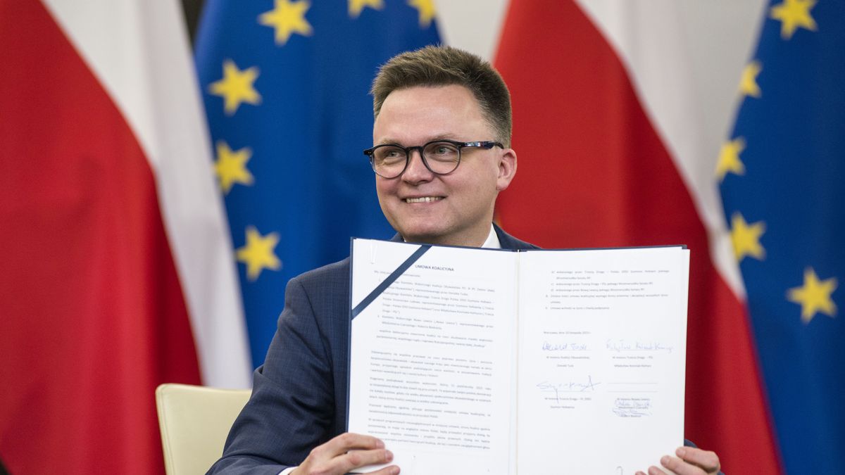 WARSAW, POLAND - 2023/11/10: Szymon Holownia, head of the Poland 2050 party, shows the signed coalition agreement in the Parliament. The leaders of Polish opposition parties have signed a coalition agreement that lays out a road map for governing the nation over the next four years. The parties collectively won a majority of votes in last month's parliamentary election. Their candidate to be the next prime minister is Donald Tusk, a former prime minister who leads the largest of the opposition parties, the centrist Civic Platform. Tusk said the parties worked to seal their agreement a day before the Independence Day holiday, adding that, "We wanted to show that we are ready to take responsibility for our homeland." He said the agreement would offer a set of "signposts and recommendations" for the government he plans to lead. (Photo by Attila Husejnow/SOPA Images/LightRocket via Getty Images)