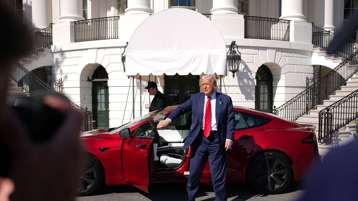 WASHINGTON, DC - MARCH 11: U.S. President Donald Trump gets out of a Tesla Model S on the South Lawn of the White House on March 11, 2025 in Washington, DC. Trump spoke out against calls for a boycott of Elon Musk’s companies and said he would purchase a Tesla vehicle in what he calls a ‘show of confidence and support’ for Elon Musk. (Photo by Andrew Harnik/Getty Images)