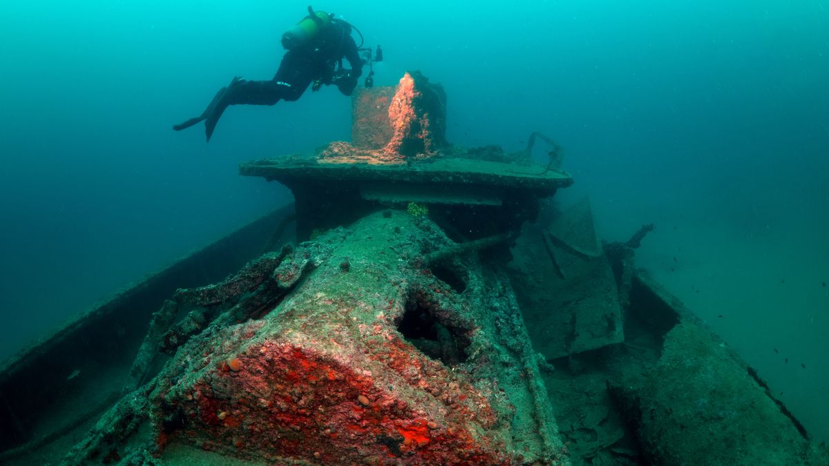 CANAKKALE, TURKIYE - MARCH 10: Divers inspect to HMS Lundy Warship Wreck, which was served as a minesweeper on behalf of the British Government during World War I, at the Historic Gallipoli Underwater Park in Canakkale, Turkiye on March 10, 2024. The ship, built in 1908, was built as a 188-ton trawler as the exact way the ship sank is unknown. The World War I shipwrecks, which were opened to diving tourism in 2021 with the initiatives of the Turkish Ministry of Culture and Tourism and the Gallipoli Historical Site Presidency, have become one of the favorite routes for those who want to explore history under water. (Photo by Tahsin Ceylan/Anadolu via Getty Images)