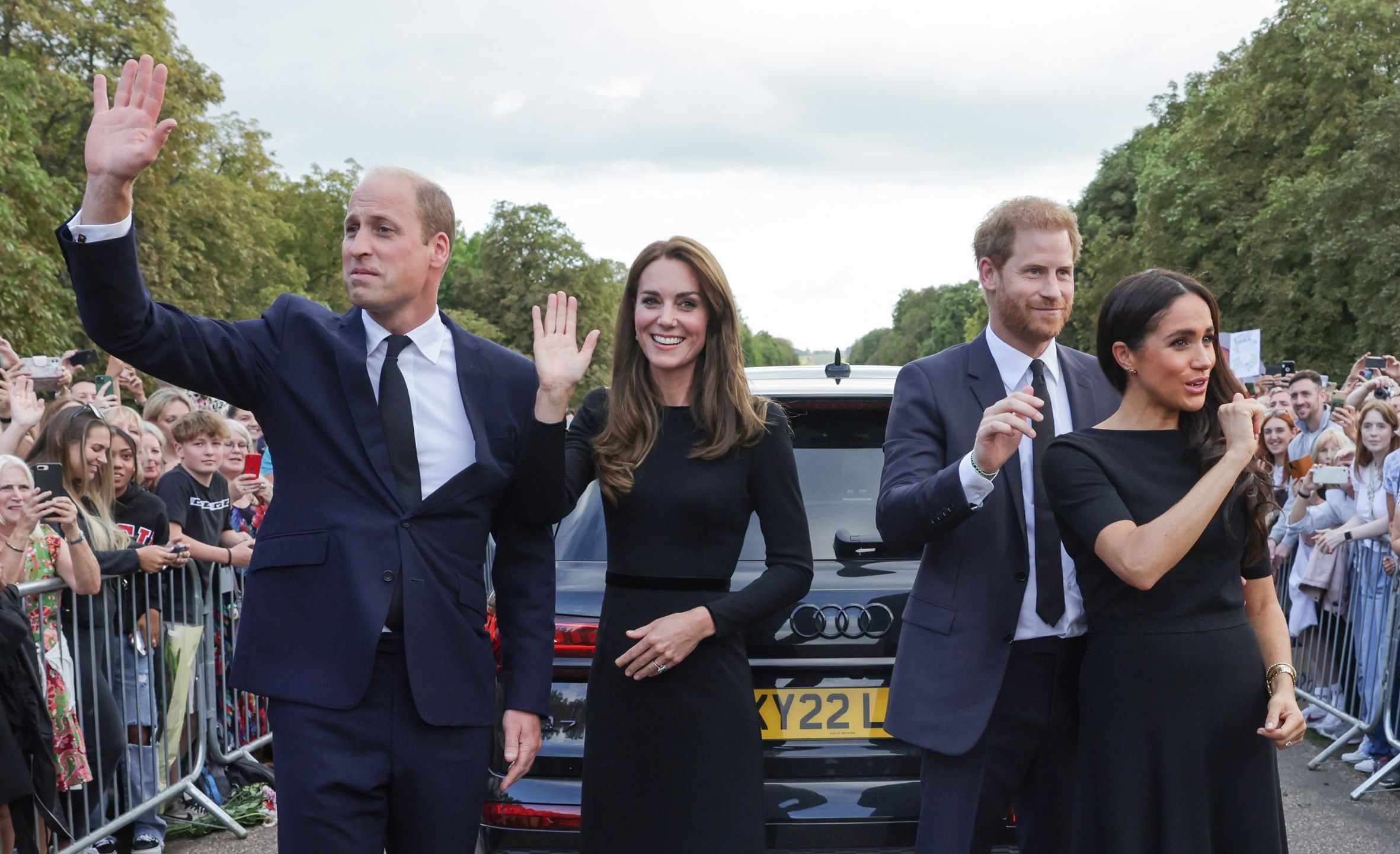 The Prince and Princess of Wales Accompanied By The Duke And Duchess Of Sussex Greet Wellwishers Outside Windsor CastleWINDSOR, ENGLAND - SEPTEMBER 10: Catherine, Princess of Wales, Prince William, Prince of Wales, Prince Harry, Duke of Sussex, and Meghan, Duchess of Sussex wave to crowd on the long Walk at Windsor Castle on September 10, 2022 in Windsor, England. Crowds have gathered and tributes left at the gates of Windsor Castle to Queen Elizabeth II, who died at Balmoral Castle on 8 September, 2022. (Photo by Chris Jackson - WPA Pool/Getty Images)Chris Jackson