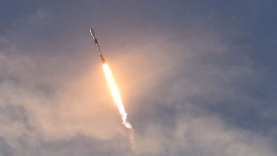 As seen from Canaveral National Seashore, a SpaceX Falcon 9 rocket carrying 60 Starlink satellites launches from pad 39A at the Kennedy Space Center on October 6, 2020 in Cape Canaveral, Florida. This is the 13th batch of satellites placed into orbit by SpaceX as part of a constellation designed to provide broadband internet service around the globe.  (Photo by Paul Hennessy/NurPhoto via Getty Images)