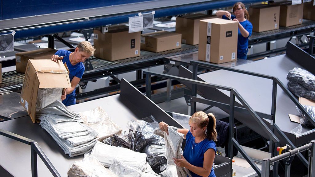 Operations At Poland's Biggest Clothes Retailer LPP SA
Employees sort boxes of clothes at the logistics center of LPP SA in Pruszcz Gdanski, Poland, on Thursday, Aug. 13, 2015. LPP is central Europe's biggest publicly-traded clothing retailer. Photographer: Bartek Sadowski/Bloomberg via Getty Images
Bloomberg
EMEA; EUROPE, POLAND; POLISH; EUROPE, MODEL; FASHION; APPAREL, RETAIL; RETAILER; STORE; STORES, FINANCE; FINANCIAL; ECONOMY, ECONOMY; ECONOMIC; ECO, MANUFACTURER; FACTORY; INDUSTRY