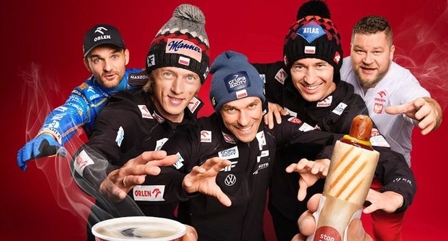 Zmarzlik, Fajdek i skoczkowie w reklamie Orlenu ścigają się o hot doga i kawę