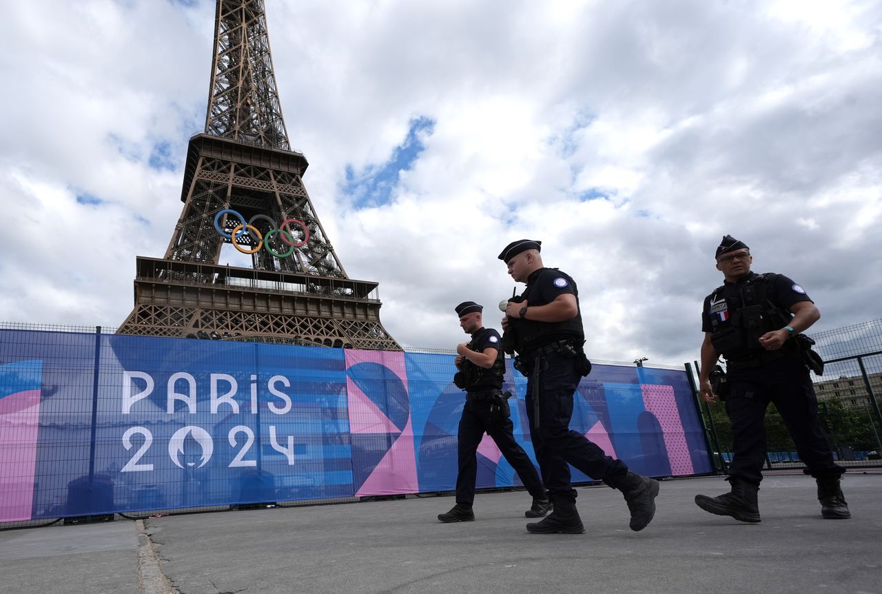 Olympics begin in Paris under cloud of fear and tight security