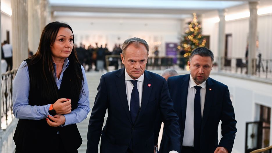 WARSAW, POLAND - DECEMBER 12: : The leader of Civic Coalition (KO) and upcoming Prime minister, Donald Tusk (C), upcoming Minister of Internal Affairs and Administration, Marcin Kierwinski (R) walk in the corridors during a session at the parliament (SEJM) on December 12, 2023 in Warsaw, Poland. on December 12, 2023 in Warsaw, Poland. After eight years of Poland's national conservative party in power, centrist Donald Tusk is back and set to forge a pro-EU government. (Photo by Omar Marques/Getty Images)