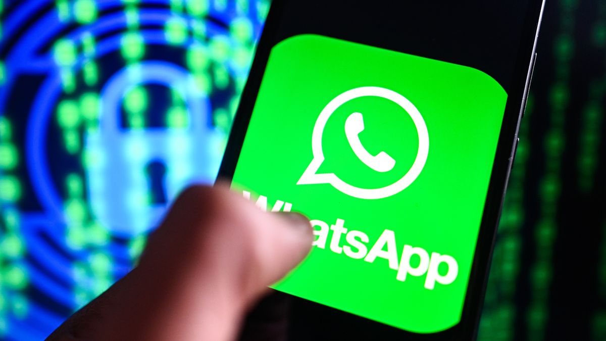 POLAND - 2024/04/04: In this photo illustration a WhatsApp logo is displayed on a smartphone with cyber security symbol on the background. (Photo Illustration by Omar Marques/SOPA Images/LightRocket via Getty Images)
