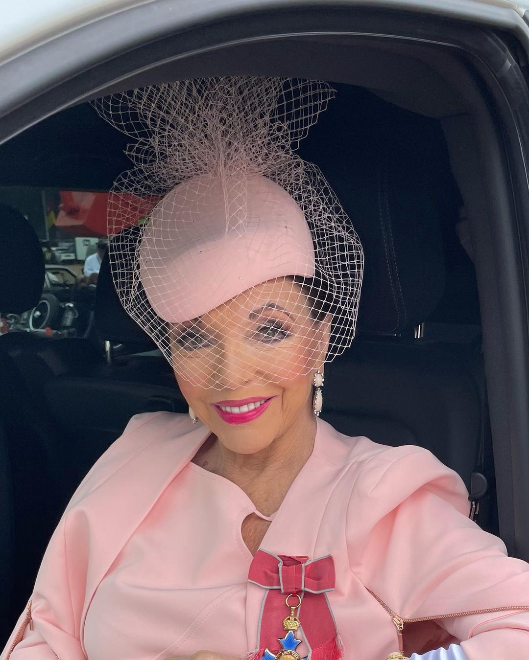 Instagram/joancollinsdbe