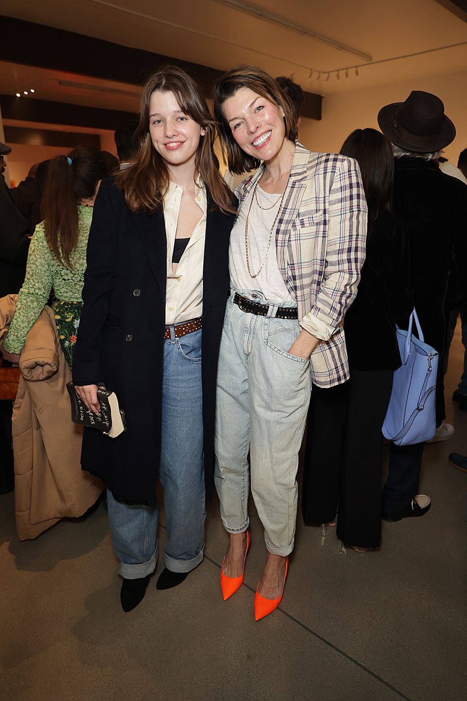 LOS ANGELES, CALIFORNIA - FEBRUARY 18: Ever Anderson (L) and Milla Jovovich attend Tara Subkoff's “What Is Coming Is Going” event at The Hole Gallery on February 18, 2023 in Los Angeles, California. (Photo by Momodu Mansaray/Getty Images for Tara Subkoff)