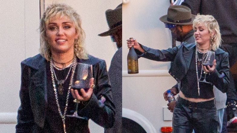 Miley Cyrus spaceruje z kieliszkiem wina