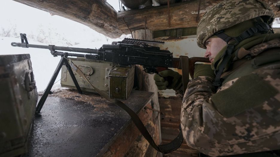 arch49A Ukrainian serviceman mans a heavy machine gun in a trench on a frontline position outside Avdiivka, Donetsk region, eastern Ukraine, Friday, Feb. 4, 2022. The U.S. accused the Kremlin of an elaborate plot to fabricate an attack by Ukrainian forces that Russia could use as a pretext to take military action against its neighbor. (AP Photo/Vadim Ghirda)AP