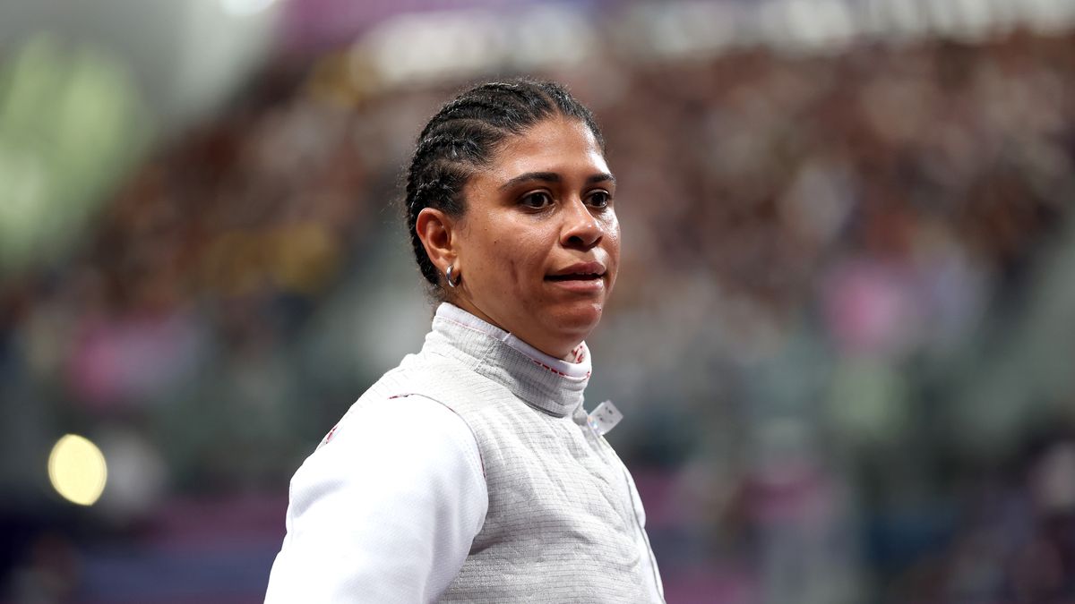 PARIS, FRANCE - JULY 28: Ysaora Thibus of Team France reacts after her defeat against Julia Walczyk-Klimaszyk of Team Poland in the Fencing Women's Foil Individual Table of 32 on day two of the Olympic Games Paris 2024 at Grand Palais on July 28, 2024 in Paris, France. (Photo by Patrick Smith/Getty Images)