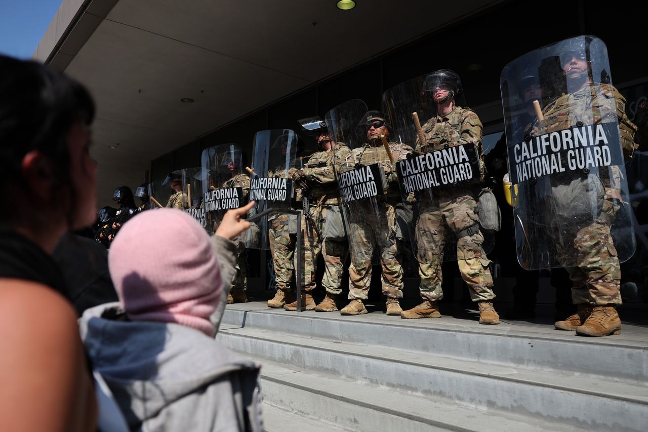Trump sends 700 US Marines to aid National Guard