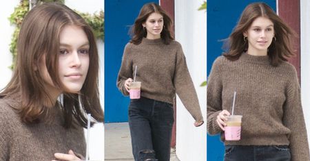 Mizerna Kaia Gerber w burym swetrze i dziurawych dżinsach