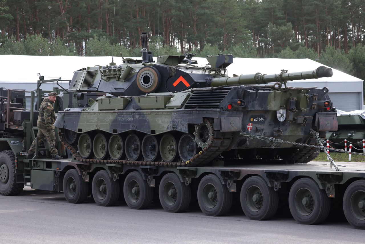 Leopard 1A5 on a wheeled transporter.