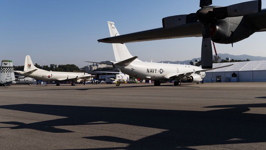 Media Preview at the Seoul International Aerospace and Defense Exhibition
A US Navy P-8 Poseidon military aircraft, manufactured by Boeing Co., center, on display during the media day of the Seoul International Aerospace & Defense Exhibition (ADEX) at Seoul Air Base in Seongnam, South Korea, on Monday, Oct. 16, 2023. The defense exhibition showcased the country's high-tech military hardware that has been much in demand since Russia's full-scale invasion of Ukraine. Photographer: SeongJoon Cho/Bloomberg via Getty Images
Bloomberg
airplanes, seoul adex, aeroplane, east asian, jet, plane, south korean, jets, expo, business news, aerospace, industries, aviation