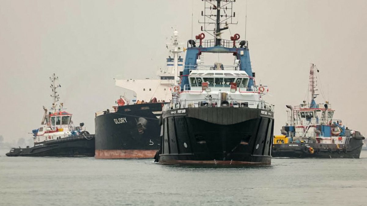 arch54
A handout picture released by the Suez Canal Authority on January 9, 2023 shows tugboats pulling the Marshall Islands-flagged bulk carrier M/V Glory in the Suez Canal near al-Qantarah between Port Said and Ismailia. - The cargo ship that ran aground in the Suez Canal early on January 9 has been refloated and the incident caused only "minor delays", the Norwegian shipping agency Leth said. "M/V Glory has been refloated by the Suez Canal Authority tugs. 21 vessels going southbound will commence/resume their transits. Only minor delays expected", Leth wrote on Twitter, adding that the "ordinary convoy" was expected to resume at 11:00 am (0900 GMT). (Photo by SUEZ CANAL AUTHORITY / AFP)
-