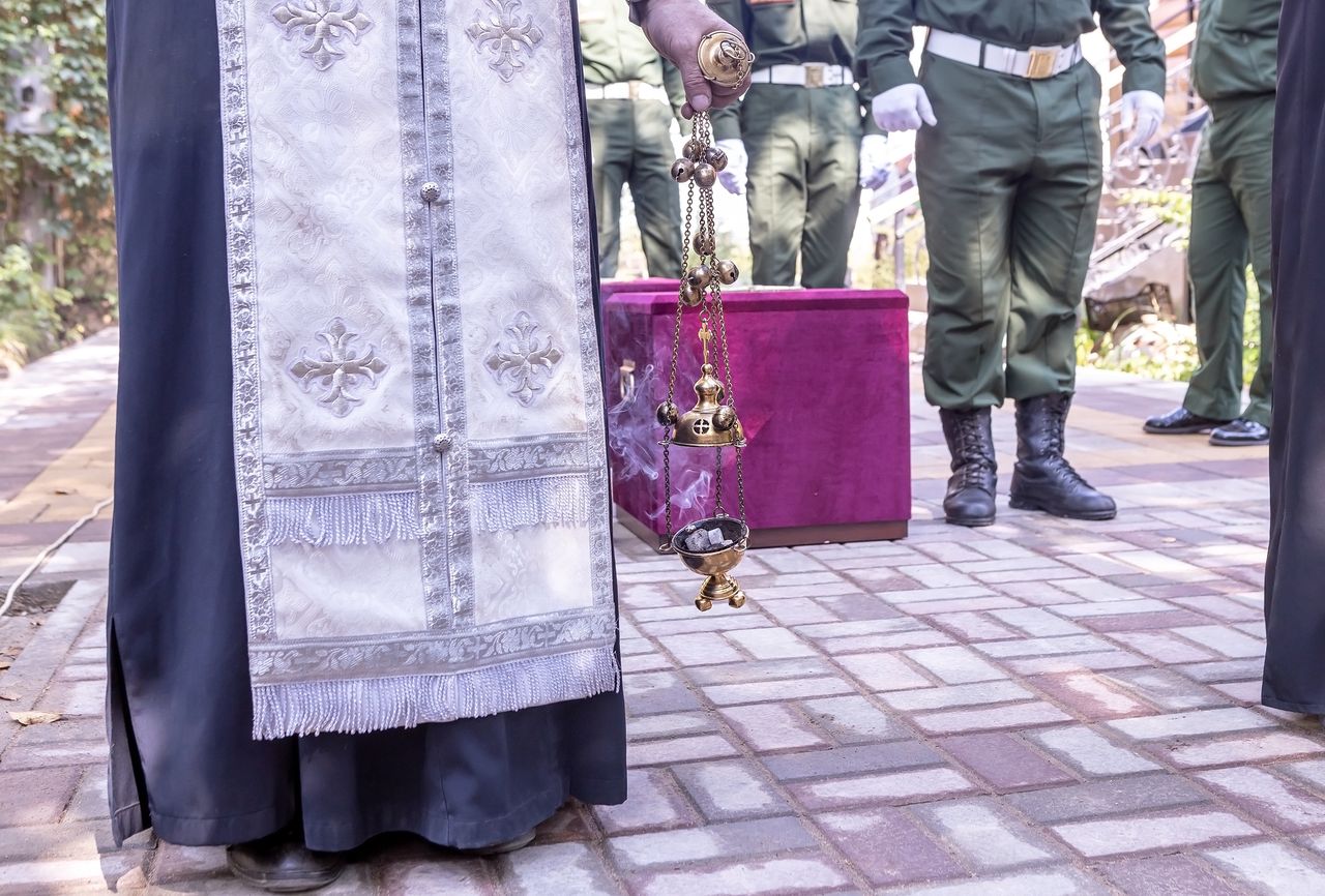 The priest and Russian soldiers