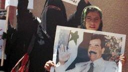 Husajn zniknie z plakatów? (fot. AFP)