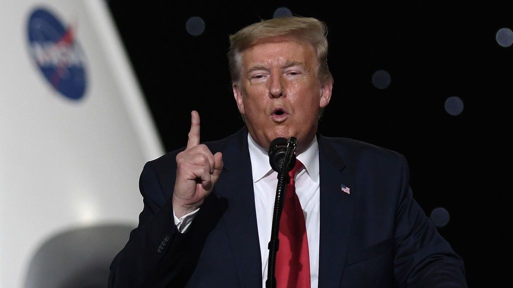 Donald Trump at SpaceX and NASA Launch
CAPE CANAVERAL, UNITED STATES - 2020/05/30: U.S. President Donald Trump speaks at NASA's Vehicle Assembly Building after watching the successful launch of a Falcon 9 rocket with the Crew Dragon spacecraft from pad 39A at the Kennedy Space Center.
NASA astronauts Doug Hurley and Bob Behnken will rendezvous and dock with the International Space Station, becoming the first people to launch into space from American soil since the end of the Space Shuttle program in 2011. (Photo by Paul Hennessy/SOPA Images/LightRocket via Getty Images)
SOPA Images
us, donald trump, speak, speaking, vehicle assembly, building, kennedy space center