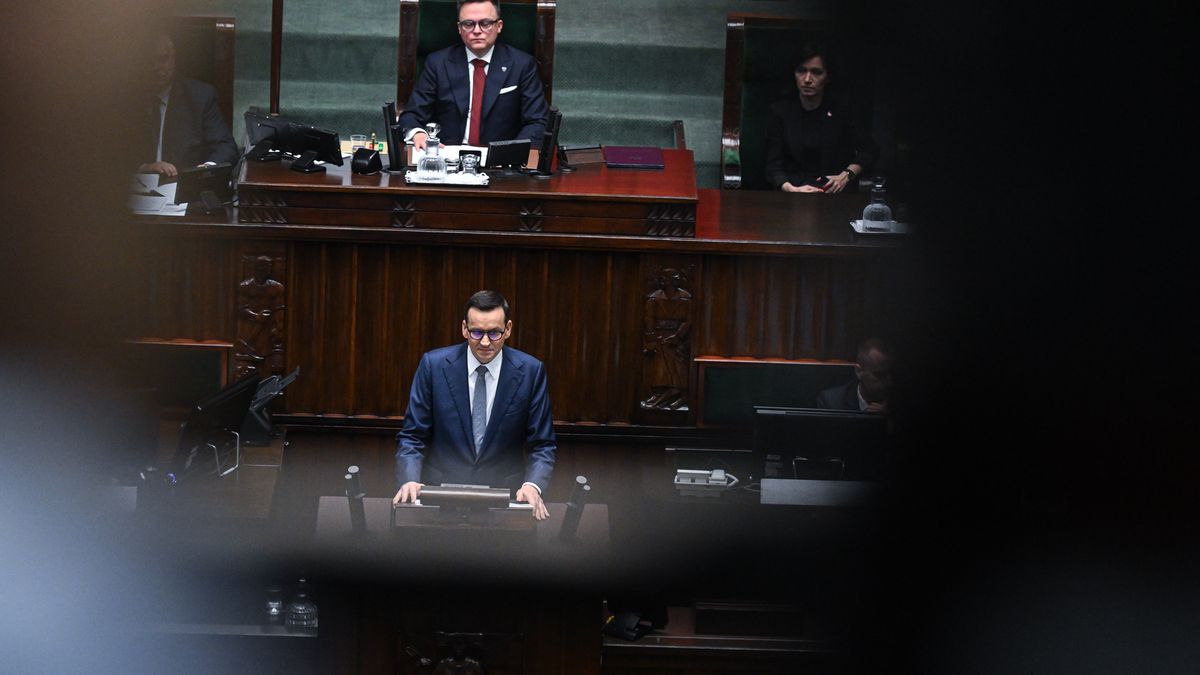 WARSAW, POLAND – DECEMBER 11: Prime Minister, Mateusz Morawiecki delivers a speech ahead of a vote of confidence on his government cabinet during a parliament session on December 11, 2023 in Warsaw, Poland. A coalition of opposition parties, with former prime minister Donald Tusk at the helm, won a majority in October's general election, ending eight years of rule by the Law and Justice (PiS) party. (Photo by Omar Marques/Getty Images)