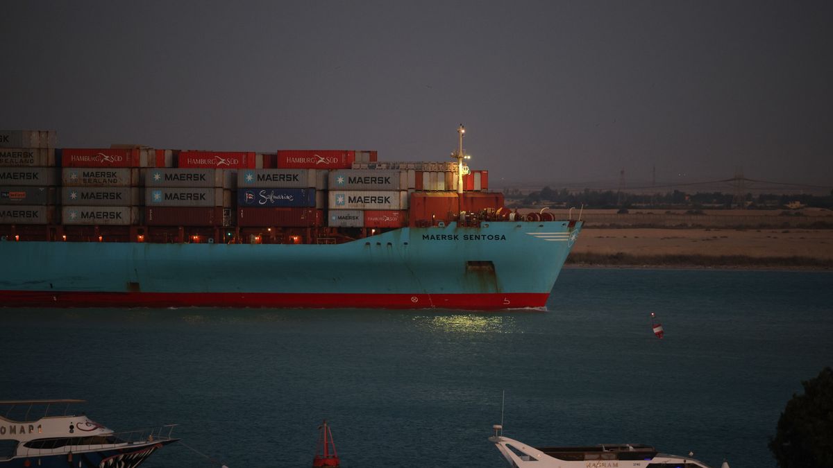 The Maersk Sentosa container ship sails southbound to exit the Suez Canal in Suez, Egypt, on Thursday, Dec. 21, 2023. A steep decline in the number of tankers entering a vital Red Sea conduit suggests that attacks on ships in the area are further disrupting a key artery of global trade. Photographer: Stringer/Bloomberg via Getty Images
