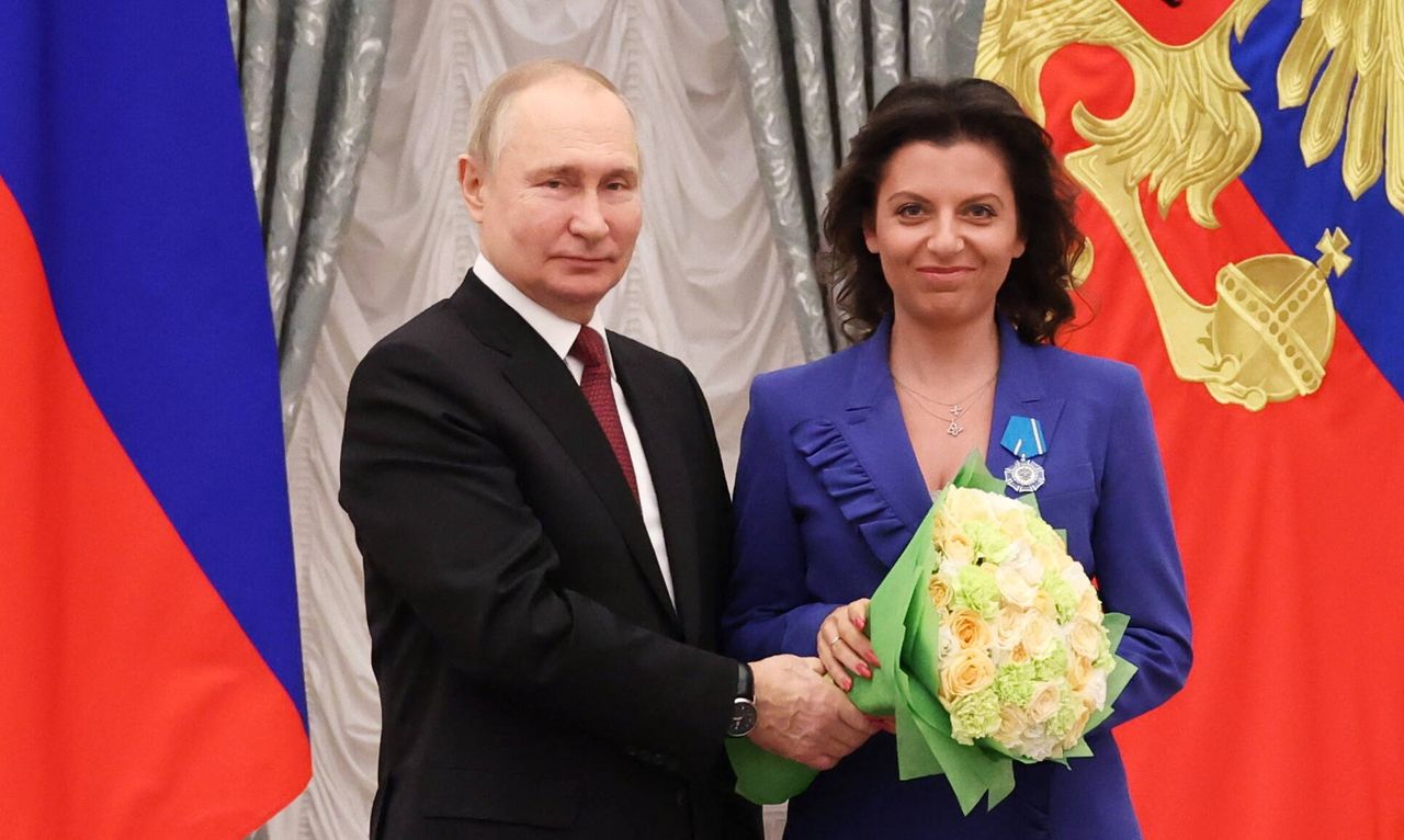 Vladimir Putin and Margarita Simonyan, editor-in-chief of Russia Today