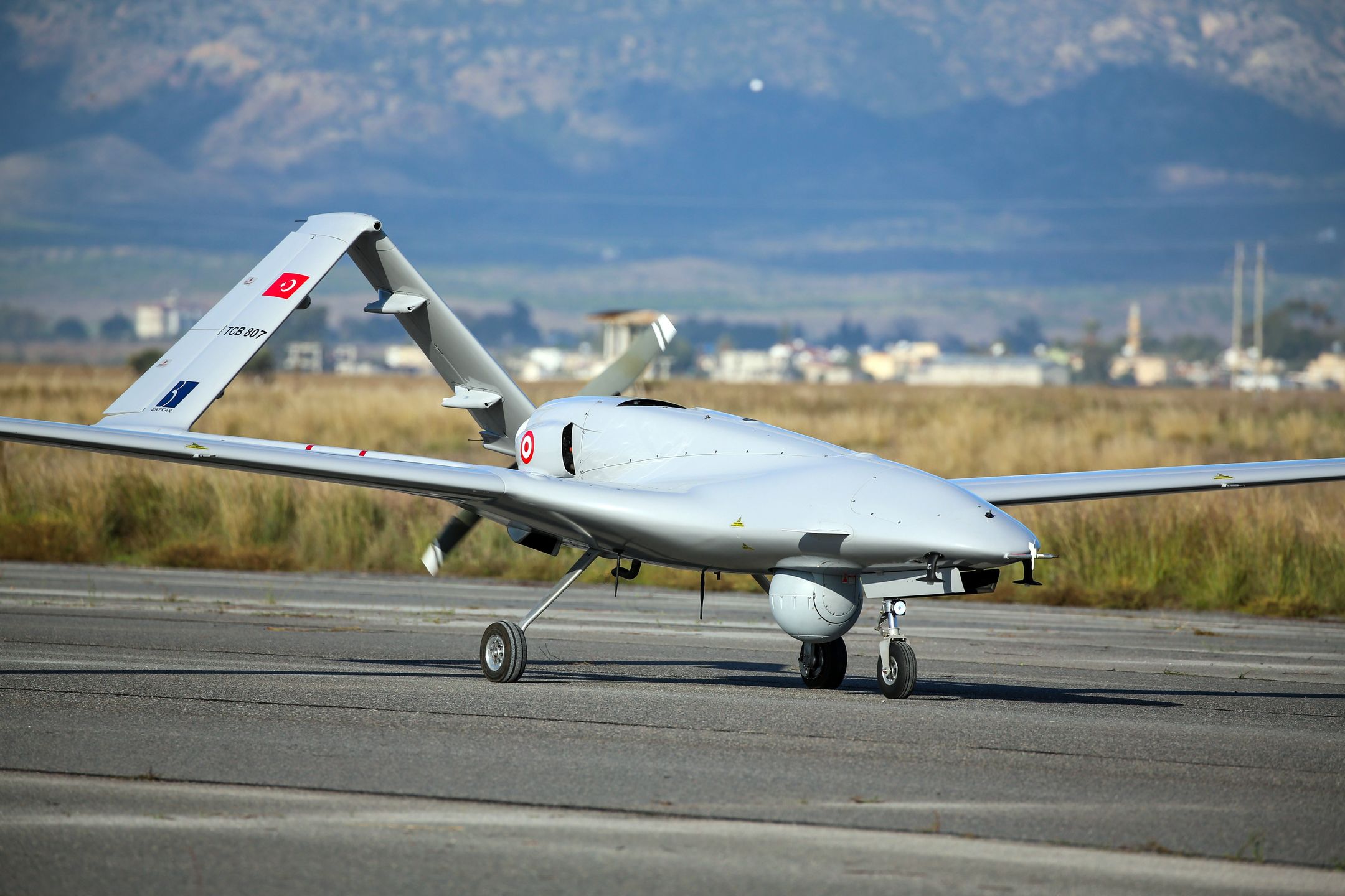 UNSPECIFIED - DECEMBER 16: The first Turkish military drone lands at Gecitkale Airport, on December 16, 2019. Bayraktar TB2 armed unmanned aerial vehicles, stationed at Naval Air Base Command in Turkey's Aegean district of Dalaman, landed in TRNC at 10 a.m. (0700GMT) following a green light from the government of the country. (Photo by Muhammed Enes Yildirim/Anadolu Agency via Getty Images)