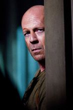 Bruce Willis chce znów być Johnem McClane'em