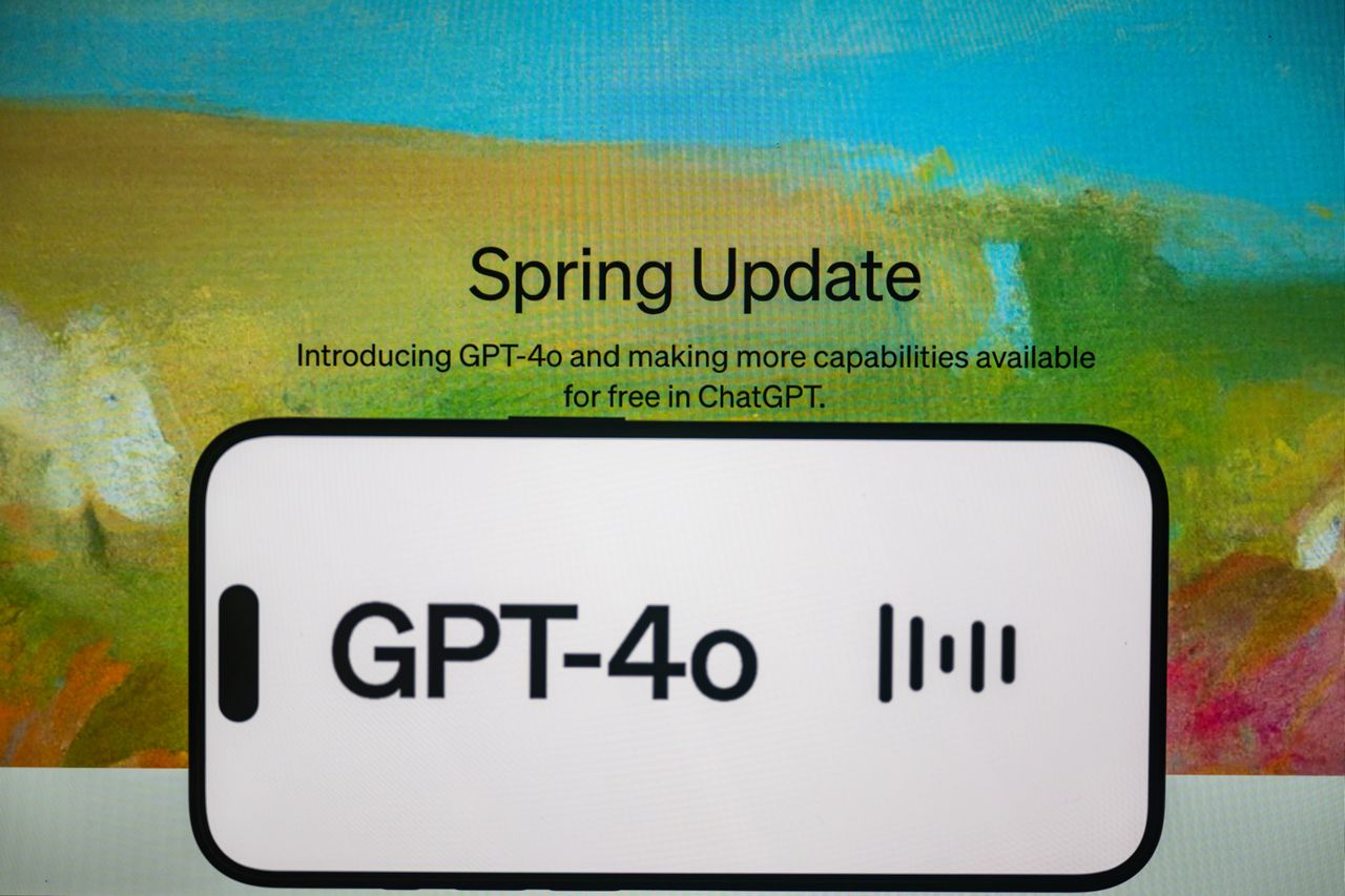 ANKARA, TURKIYE - MAY 15: In this photo illustration, the 'Chat GPT-4o' logo is displayed on a mobile phone screen in front of a computer screen displaying the 'Chat GPT' screen in Ankara, Turkiye on May 15, 2024. (Photo by Ismail Aslandag/Anadolu via Getty Images)