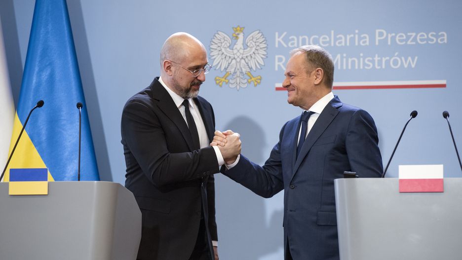 WARSAW, POLAND - 2024/03/28: Ukraine's prime minister Denys Smyhal (L) and PM Donald Tusk (R) shake hands at a press conference in Warsaw. Poland's Prime Minister Donald Tusk and Ukraine's Prime Minister Denys Shmyhal signed agreements as the Polish and Ukrainian governments hold talks seeking to end an impasse over trade, with Polish farmers angry over the influx of Ukrainian food and agricultural products which they blame for hurting their business. The Prime Ministers also talked about strong support and how to strengthen Ukraine in the war. (Photo by Attila Husejnow/SOPA Images/LightRocket via Getty Images)