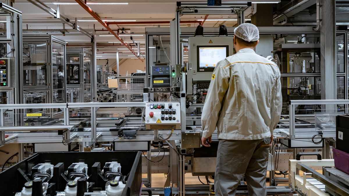 An employee operates a machine on the production line of the MK C2 brake system module at the Continental AG manufacturing plant in Frankfurt, Germany, on Friday, March 3, 2022. The German auto supplier is scheduled to announce full year earnings on March 8. Photographer: Ben Kilb/Bloomberg via Getty Images