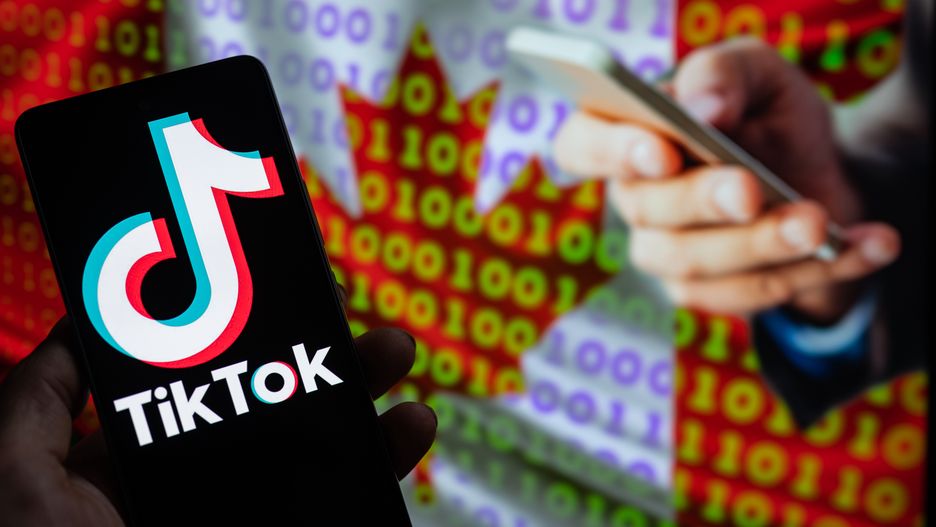 TikTok displayed on mobile with on screen Canada flag with cyber code, seen in this photo illustration. On 28 February 2023 in Brussels, Belgium.  (Photo by Jonathan Raa/NurPhoto via Getty Images)