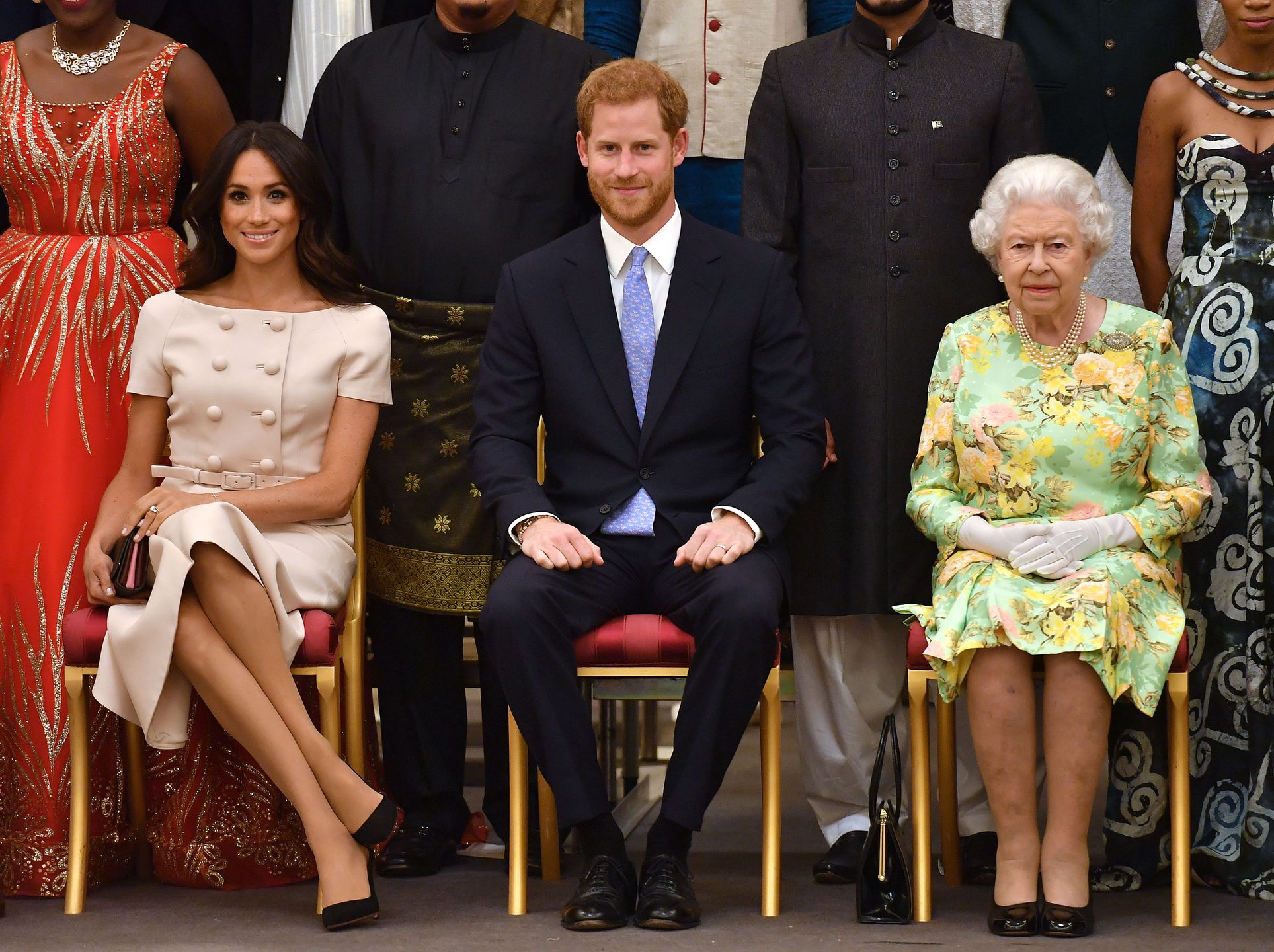 Meghan Markle, książę Harry i królowa Elżbieta II