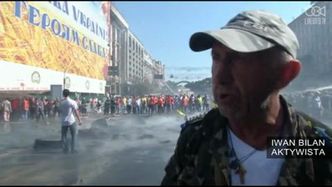 Konfrontacja między demonstrantami a pracownikami służby porządkowej w Kijowie