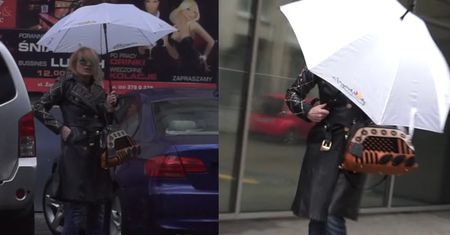 Rozczochrana Olejnik zasłania się parasolem!