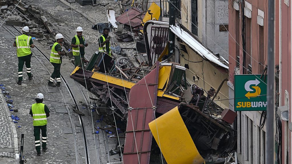 Lisbon Funicular Derails In Deadly Accident
LISBON, PORTUGAL - SEPTEMBER 04: Carris personnel inspect the wrecked Gloria funicular on September 04, 2025 in Lisbon, Portugal. Seventeen people were killed and around 20 injured when a car on the Glória Funicular derailed in Lisbon. The iconic funicular railway line, also called Elevador da Glória, connects Lisbon's Restauradores Square to the neighborhood of Bairro Alto via a steep 275 meter (900ft) climb, and is popular among tourists. (Photo by Horacio Villalobos/Getty Images)
Horacio Villalobos