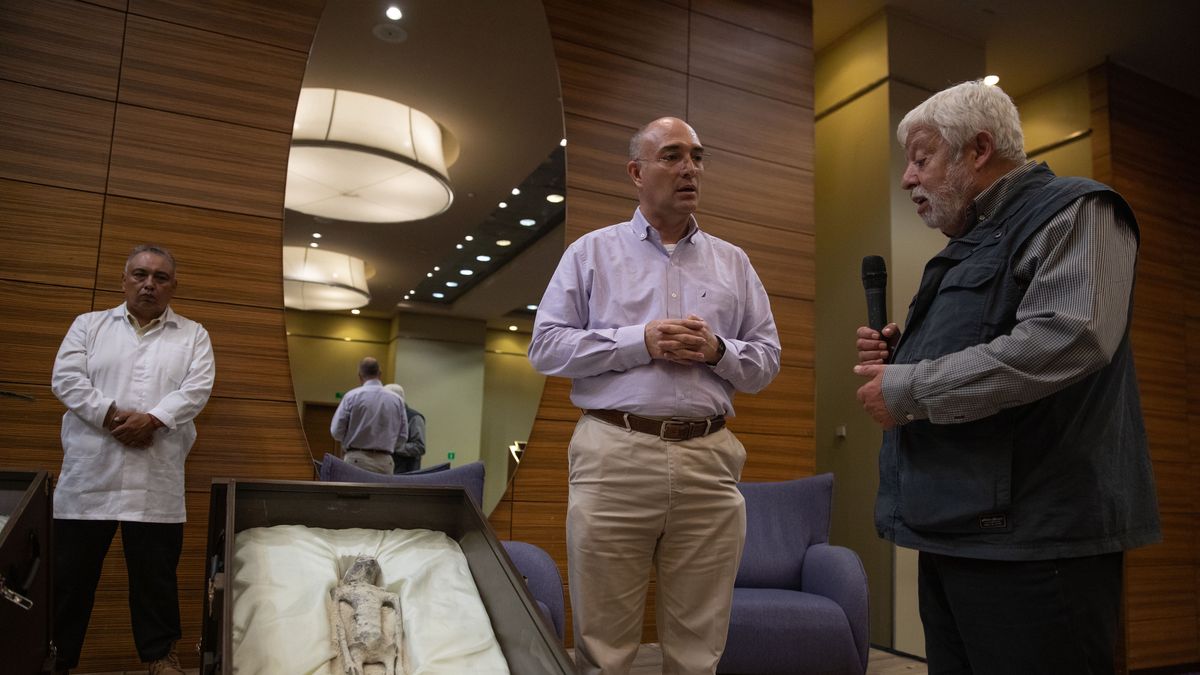 MEXICO CITY, MEXICO - SEPTEMBER 13: Jose de Jesus Zalce Benitez, Director of the Scientific Institute for Health of the Mexican navy is interviewed by Mexican journalist and UFO expert, Jaime Maussan, during a press conference where two 'non-human' beings were displayed to the media, at the Camino Real hotel, in Mexico City, Mexico on September 13, 2023. The press conference was holding the day after the country's first public congressional hearing on the topic with UFO experts. The bodies displayed in cases, have three fingers on each hand they were recovered in Peru in 2017, they have no relation to human beings, experts said. (Photo by Daniel Cardenas/Anadolu Agency via Getty Images)