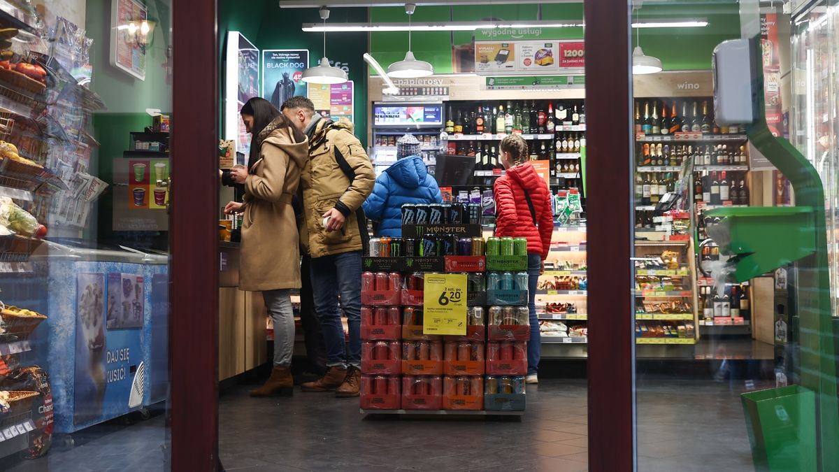 Customers are seen inside a grocery shop in Krakow, Poland on November 27, 2022. Most of the shops are closed most sundays in Poland. Exceptions are e.g. owner-operated stores, post offices or gas stations. (Photo by Jakub Porzycki/NurPhoto via Getty Images)