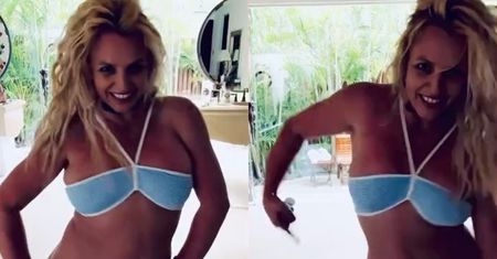 Odziana w niebieskie bikini Britney Spears klepie się po pośladkach podczas dzikiego tańca i chwali "nowymi włosami"