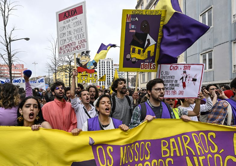 Protest Over Right To Housing In LisbonLISBON, PORTUGAL - APRIL 01: Demonstrators hoist signs while parading during the "Casa Para Viver" (A House to Live In) protest on April 01, 2023 in Lisbon, Portugal. Demonstrations for the right to housing are held in Lisbon, Porto, Viseu, Aveiro, Coimbra and Braga to protest the increase in house prices while wages have stagnated or have decreased. The protest organizers state that precarious housing conditions and the high prices of real estate in Portugal led some 100 organizations to unite and sign a manifesto with 12 proposals such as effective regulation of rents, penalization of empty houses, suspension of evictions and the end of tax incentives for non-regular residents. (Photo by Horacio Villalobos#Corbis/Getty Images)Horacio Villalobos
