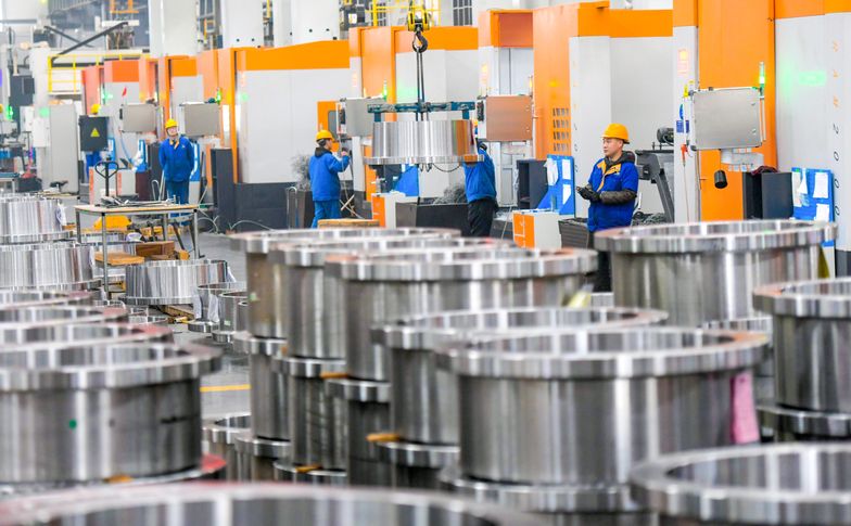 LUOYANG, CHINA - MARCH 05: Employees manufacture locking discs for wind turbines at the factory of Luoyang Haozhi Machinery Co., Ltd. on March 5, 2025 in Luoyang, Henan Province of China. (Photo by Zhang Yixi/VCG via Getty Images)