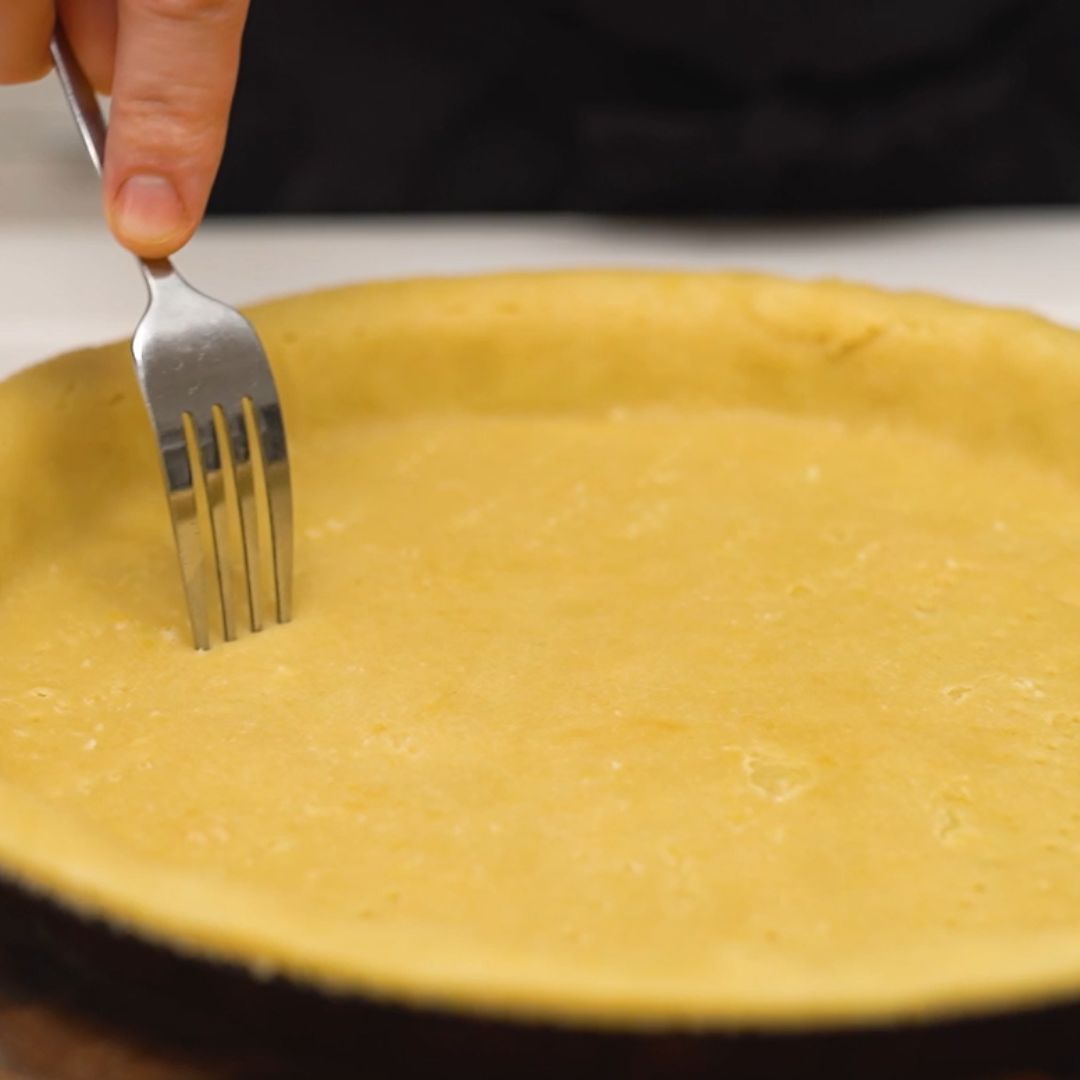 Pierce the dough well with a fork before putting it in the oven.