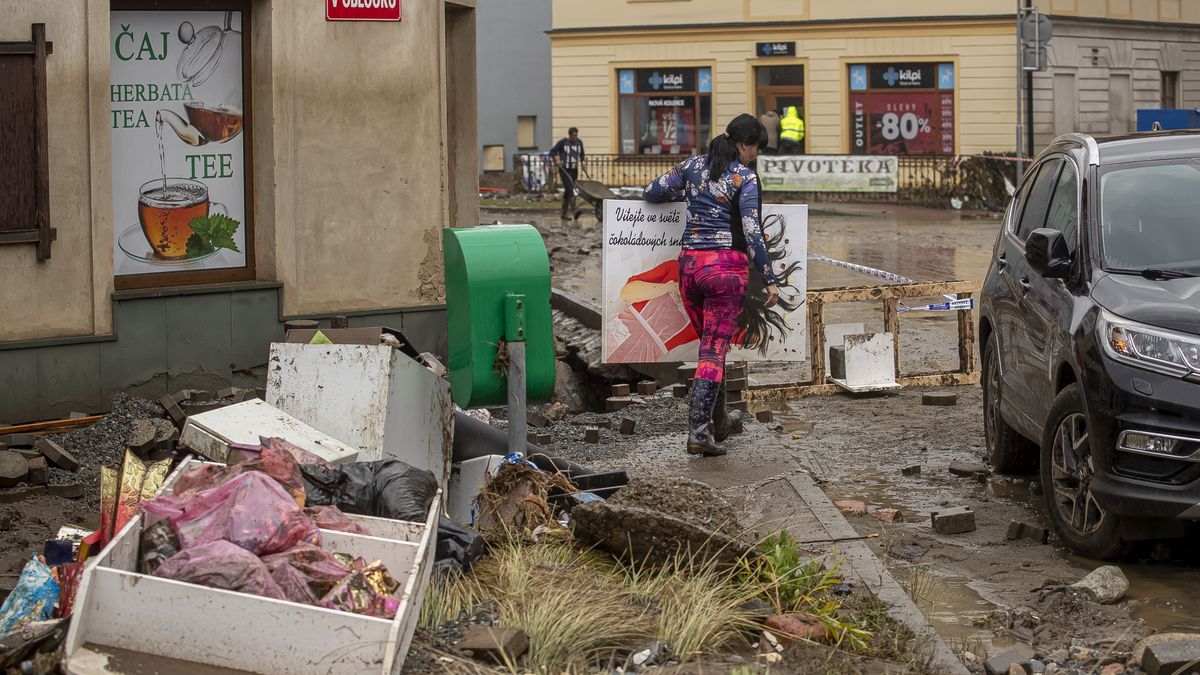 JESENIK, CZECH REPUBLIC - SEPTEMBER 16: A woman cleans a flooded shop on September 16, 2024 in Jesenik Czech Republic. There have been extreme weather and flood warnings as heavy rainfall sweeps the Czech Republic, Poland, Germany, Austria and Slovakia. (Photo by Gabriel Kuchta/Getty Images)