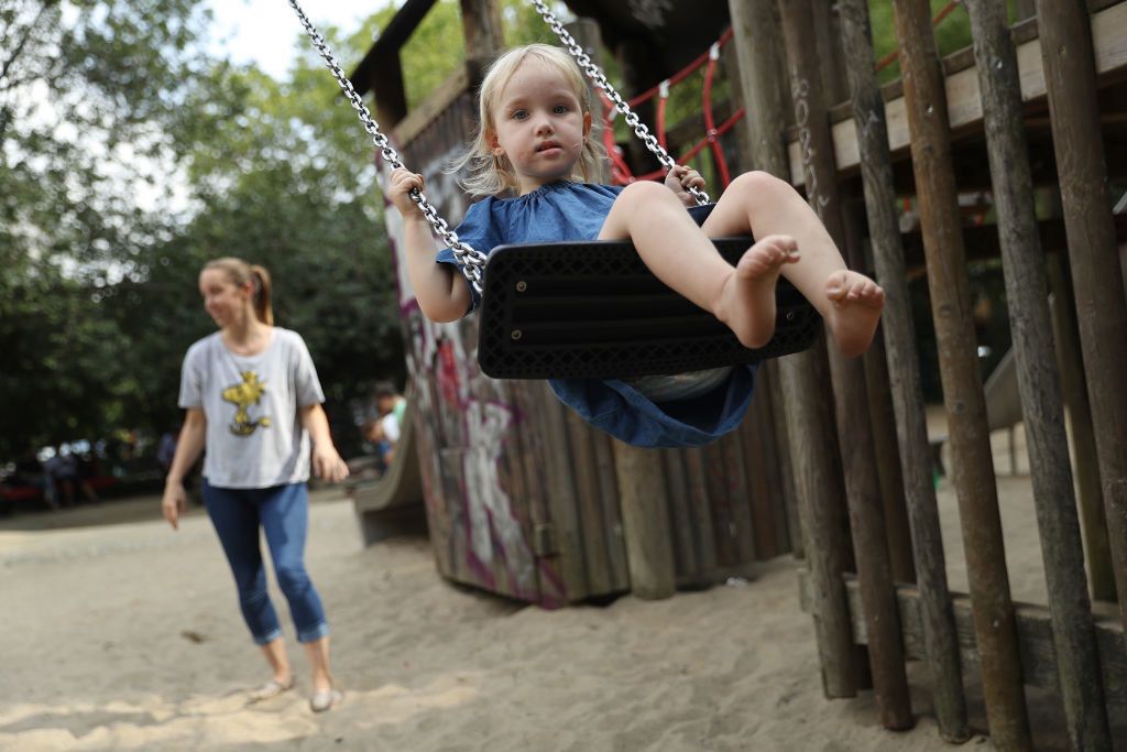 Political Parties Debate Child Benefits
BERLIN, GERMANY - AUGUST 31:  (EDITOR'S NOTE: Subject agreed to be photographed). Heidi, 2, gets a push on a swing from her mother Anna at a playground on August 31, 2017 in Berlin, Germany. With approximately three weeks to go before federal elections in Germany political parties are debating Germany's child benefits policy. Known in German as "Kindergeld," parents receive monthly money from the state for each child as a form of subsidy to encourage families to have children. Germany suffered from a falling birthrate for decades, a phenomenon that has reversed in recent years.  (Photo by Sean Gallup/Getty Images)
Sean Gallup
Kindergeld, child support, children, child