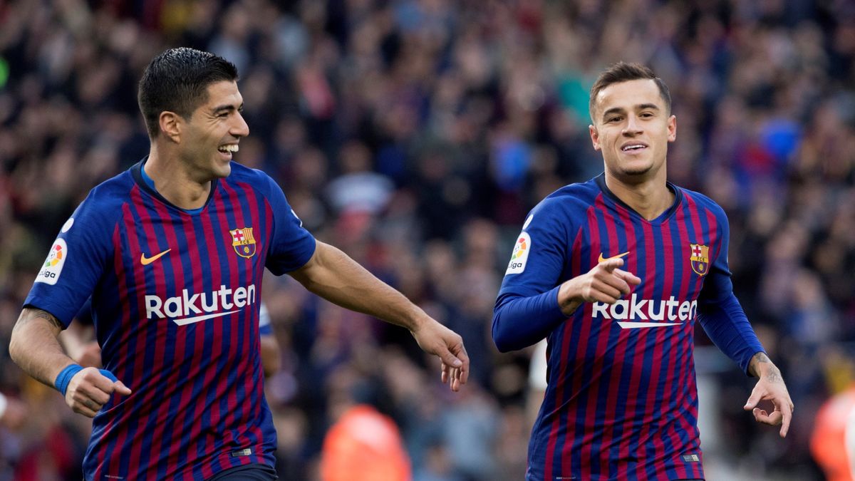 Luis Suarez (z lewej) i Philippe Coutinho (z prawej)