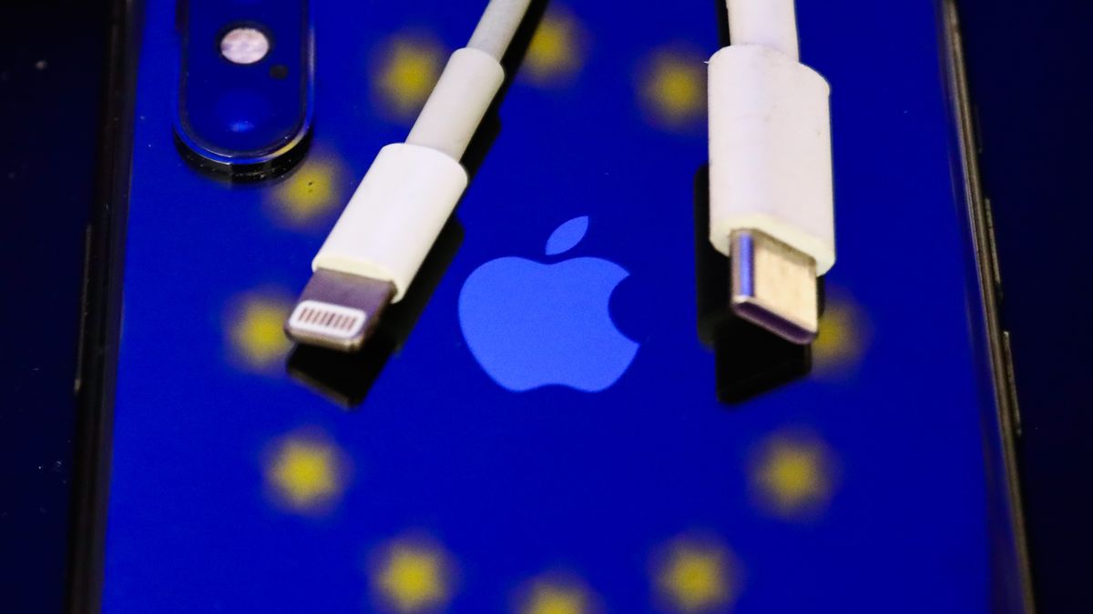 Lightning and USB-C cables are seen with European Union flag reflected on Apple iPhone in this illustration photo taken in Krakow, Poland on September 25, 2021. (Photo by Jakub Porzycki/NurPhoto via Getty Images)