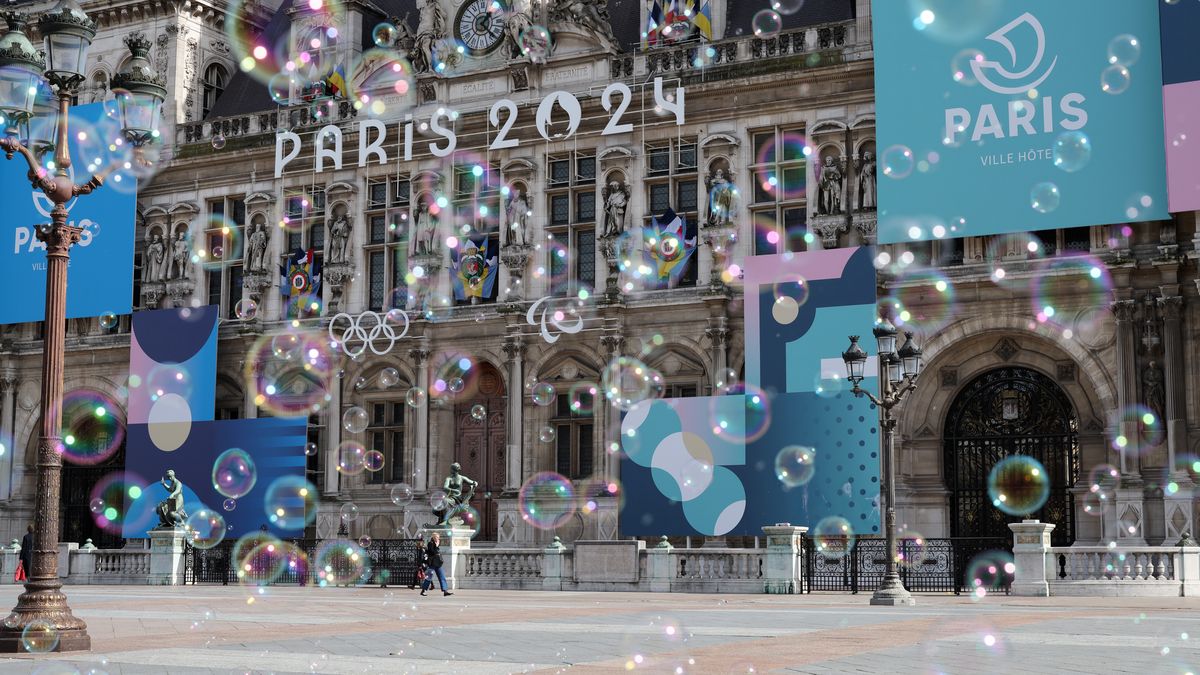 Landmarks Around Paris Ahead Of The Summer Olympics
PARIS, FRANCE - MARCH 14:  The Paris 2024 logo, representing the Olympic and Paralympic Games four months prior to the start of the Paris 2024 Olympic and Paralympic games is displayed on the facade of Paris town hall as soap bubbles float in the air on March 14, 2024 in Paris, France. The city is gearing up to host the XXXIII Olympic and Paralympic Summer Games, from 26 July to 11 August. (Photo by Pascal Le Segretain/Getty Images)
Pascal Le Segretain