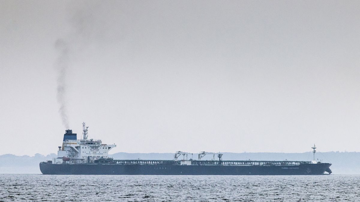 The shadow fleet tanker Turbo Voyager transits through the Great Belt of Denmark off the coast of Agerso, Denmark, on Thursday, Aug. 15. 2024. On the small Danish island of Agerso, fisherman and beach-goers see old tankers carry Russian oil through Denmark's narrow straits on a daily basis. Photographer: Carsten Snejbjerg/Bloomberg via Getty Images